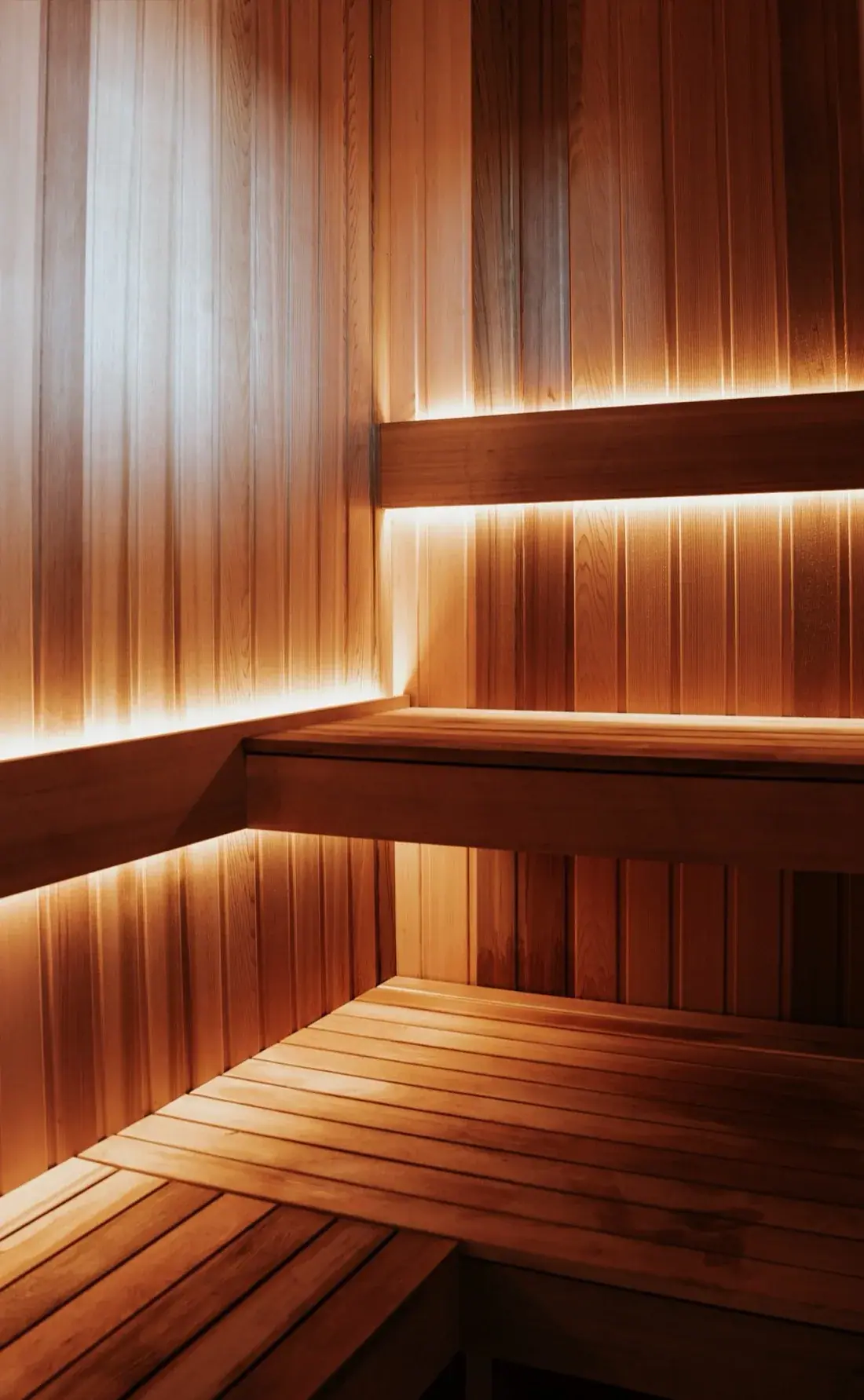 Finished cedar bench and concealed lighting inside a Zerenity sauna