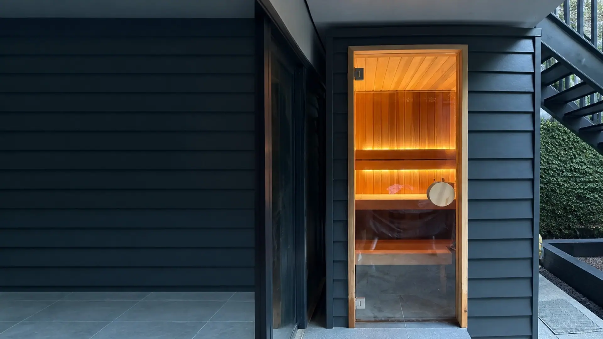 Wide view of a completed custom sauna integrated into a Sydney home